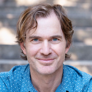 Braden Abraham as the Artistic Director of Writers Theatre